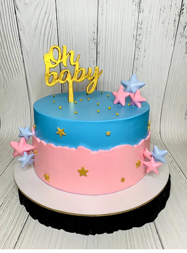 Oh baby pink and blue baby shower cake