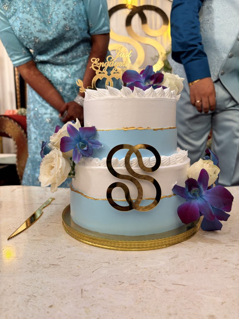 Two-tier celebration cake with orchids